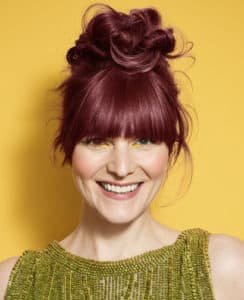 red hair woman on yellow background